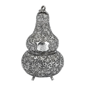 A mid to late 19th century Chinese export silver double gourd tea caddy or wine bottle, Canton circa 1870 retailed by Cum Shing