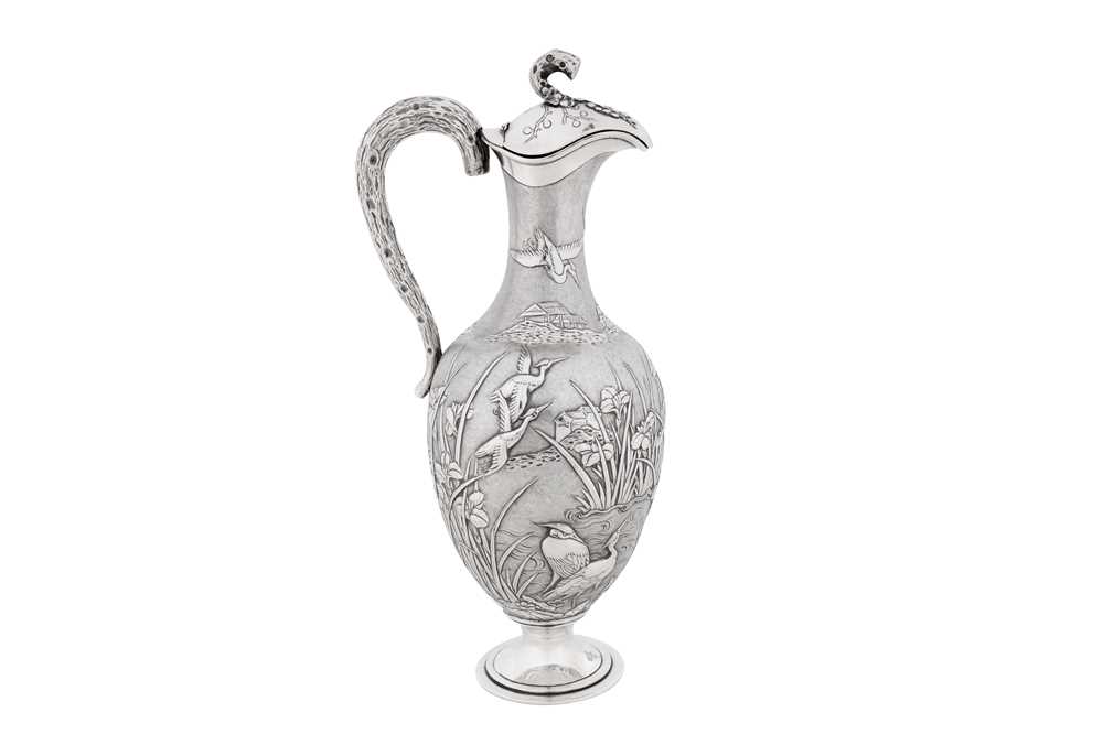 A late 19th / early 20th century Chinese export silver ewer, Canton circa 1900 marked Ye Bo, retailed by Wang Hing