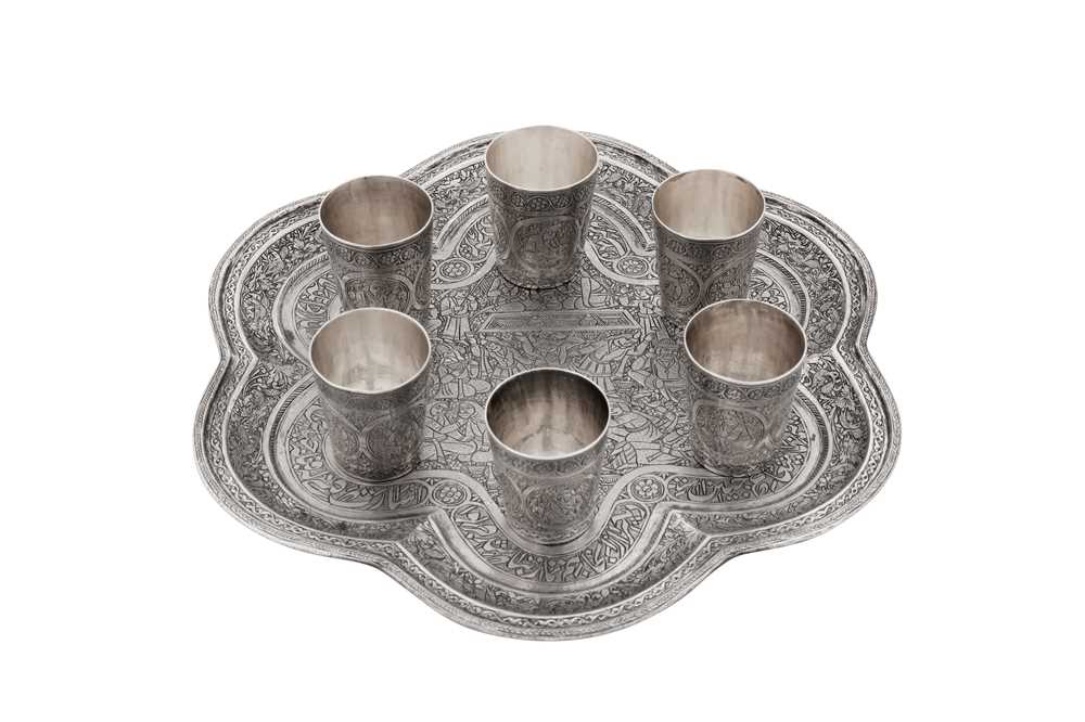 An early 20th century Persian (Iranian) silver shots set on tray, Isfahan circa 1920 by Ja'far