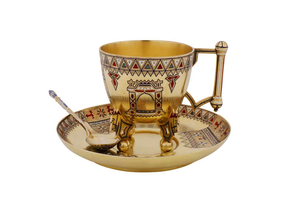 An Alexander III late 19th century Russian 88 zolotnik silver gilt and champlevé enamel cup and saucer, Saint Petersburg circa 1890 by Theodor Nygren (active 1874-1898)