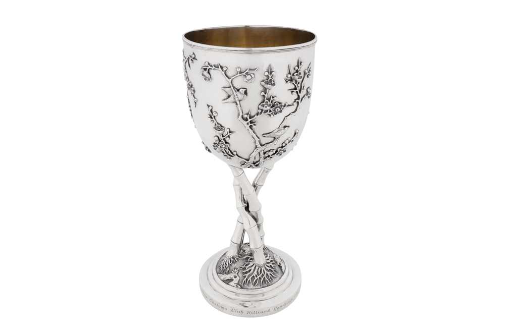 An early 20th century Chinese export silver standing cup, Canton and Shanghai dated 1905, marked An Chang, retailed by Luen Wo of Shanghai