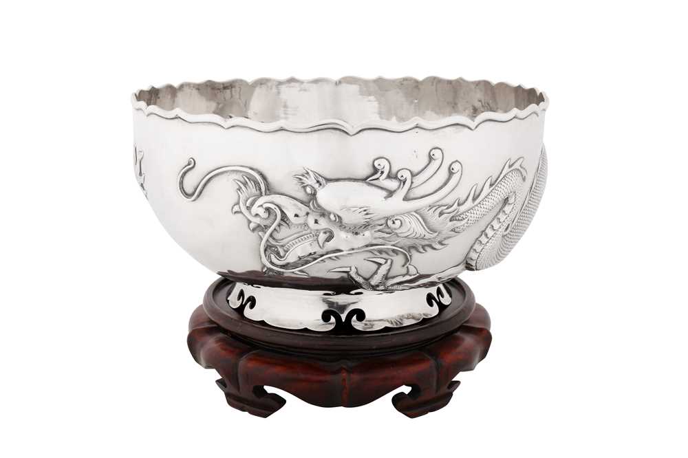 An early 20th century Chinese export silver bowl, Shanghai circa 1910, marked Hou Xiang, retailed by Wang Hing