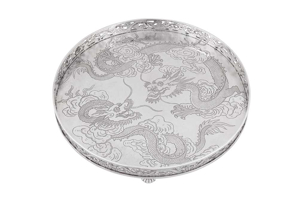 A late 19th century Chinese export silver tray, Canton circa 1890, marked Qiu Ji, retailed by Wang Hing