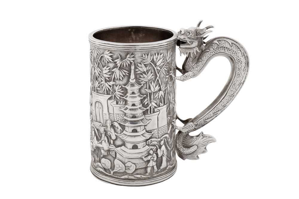 A late 19th century Chinese export silver mug, Canton circa 1870, marked Hui, retailed by Cum Wo of Hong Kong