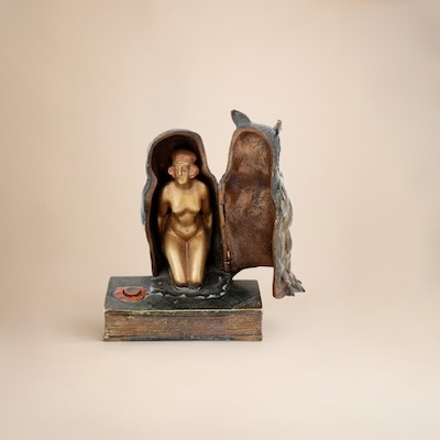 Franz Xavier Bergmann (Austrian 1861-1936) Erotic metamorphic model of an owl on book opening to reveal a kneeling female nude