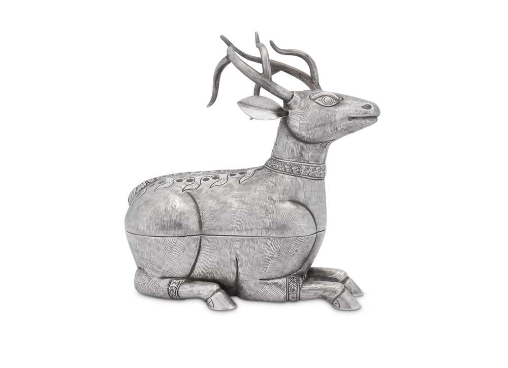 A mid-20th century Cambodian silver betel box formed as a recumbent stag, circa 1960
