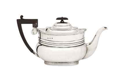 Lot 427 - An Edwardian sterling silver teapot, Sheffield...