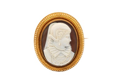 Lot 58 - A shell cameo brooch, carved to depict a lady...