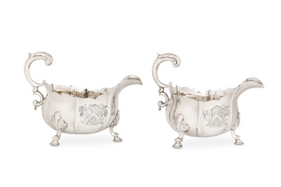 Lot 60 - A pair of George II sterling silver sauceboats,...
