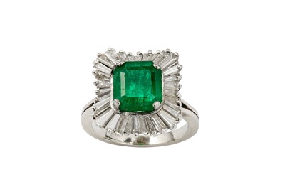 Lot 73 - An emerald and diamond ballerina ring The step-...