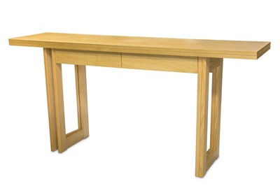 Lot 286 - A Heals light oak console or dining table, the...