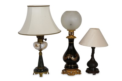 Lot 213 - A collection of three table lamps, including a...