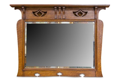 Lot 236 - An Arts & Crafts oak mirror, with a shelf over...