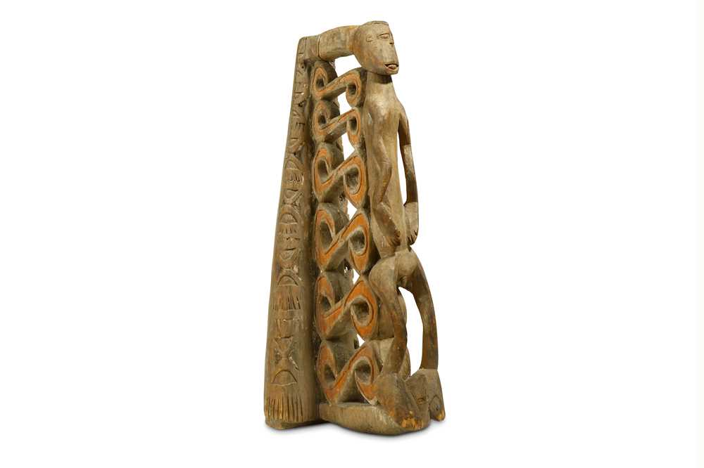 Lot 194 - AN ASMAT CANOE PROW The decorative prow is...