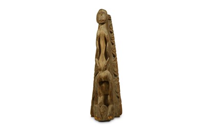 Lot 194 - AN ASMAT CANOE PROW The decorative prow is...