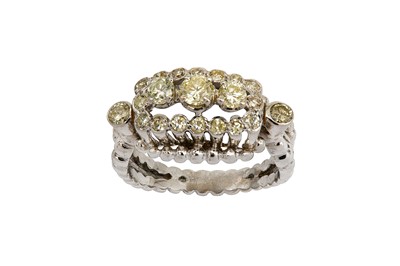 Lot 32 - A diamond dress ring Set with three graduated...