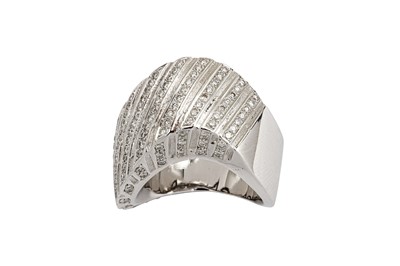 Lot 118 - A diamond dress ring Of swirling design, set...