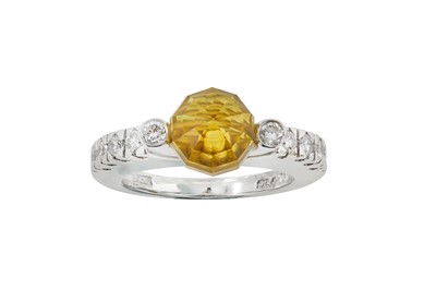 Lot 49 - A citrine and diamond dress ring The faceted...