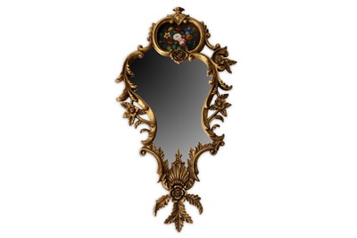 Lot 274 - A giltwood mirror, of shaped outline with...