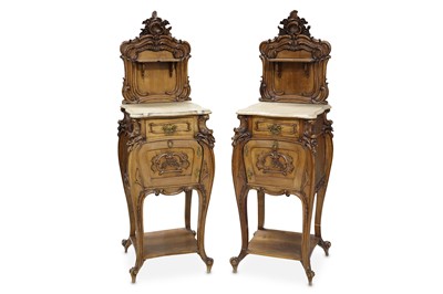 Lot 255 - A pair of 19th Century French walnut bedside...