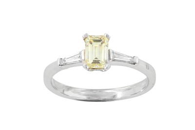 Lot 114 - A diamond ring The emerald-cut diamond, in a...