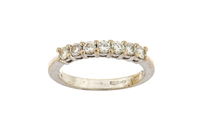 Lot 228 - A diamond half eternity ring, mounted in 18...