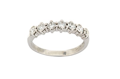 Lot 227 - A diamond half eternity ring, mounted in white...