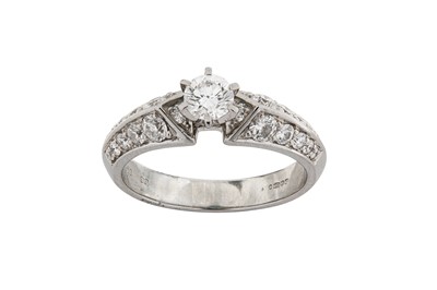 Lot 217 - A diamond ring, mounted in platinum, principal...