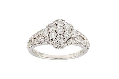 Lot 234 - A diamond cluster ring, mounted in 18 carat...