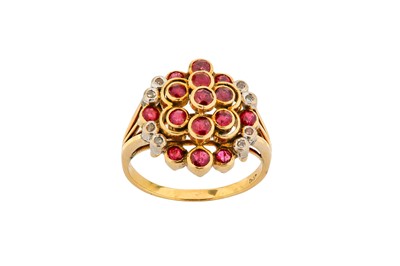 Lot 238 - A ruby and diamond cluster ring