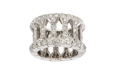 Lot 182 - A diamond band ring The wide openwork band...