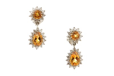 Lot 50 - A pair of citrine and diamond pendent earrings...