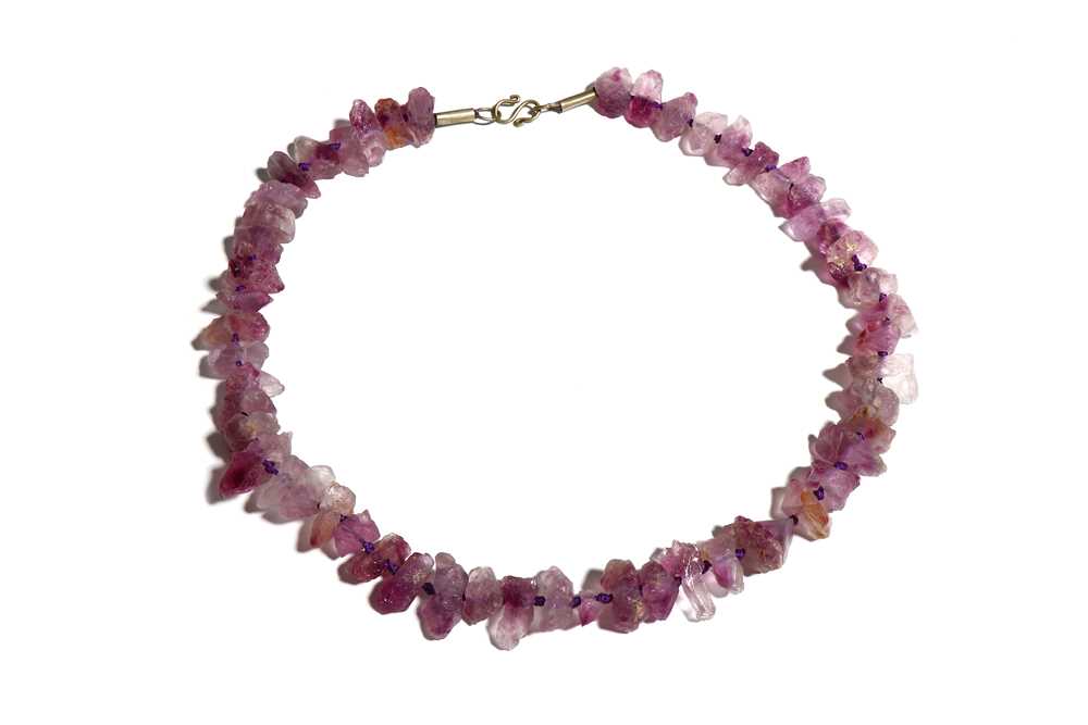 Lot 55 - AN AMETHYST NECKLACE Restrung with a modern...