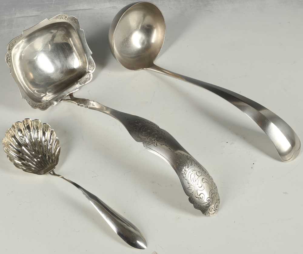 Lot 21 - Three Dutch silver ladles. (3)