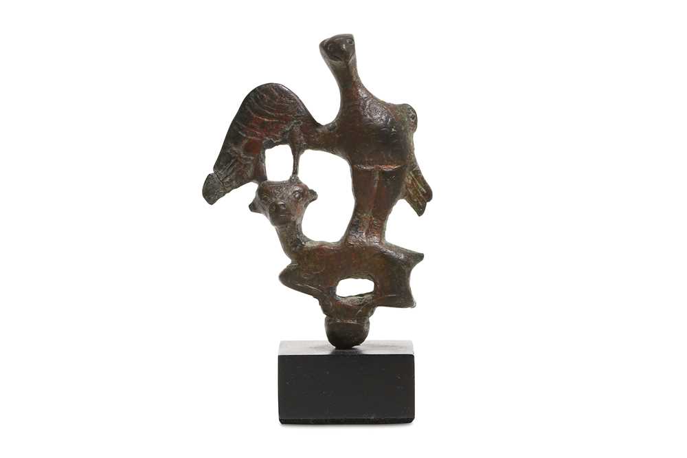 Lot 48 - A BRONZE ZOOMORPHIC GROUP OF AN EAGLE AND BULL...