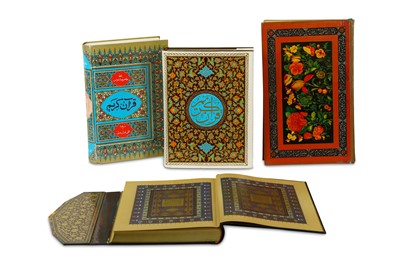 Lot 243 - FOUR EDITIONS OF THE QUR'AN Iran, 20th century...