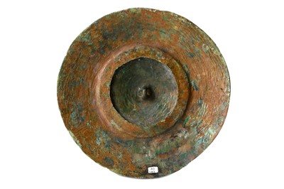 Lot 99 - A WESTERN ASIATIC BRONZE SHIELD FITTING  Circa...