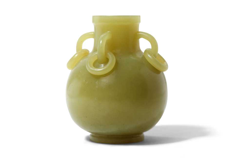 Lot 446 - A CHINESE YELLOW JADE VASE. The ovoid body...
