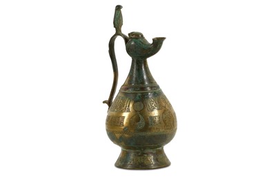 Lot 106 - A KHORASSANI BRASS EWER North-Eastern Iran,...