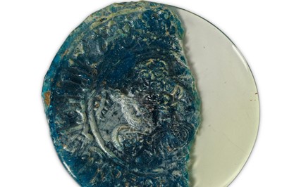 Lot 126 - TWO FRAGMENTS OF HOT-WORKED GLASS MEDALLIONS...