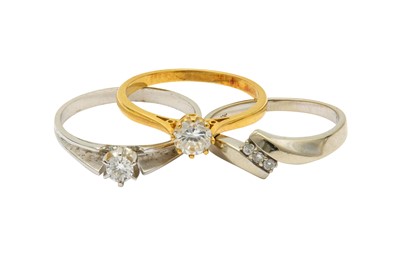 Lot 567 - Three rings Including a brilliant-cut diamond...