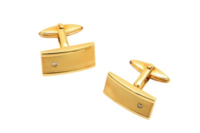 Lot 562 - A pair of diamond-set cufflinks Of reeded...