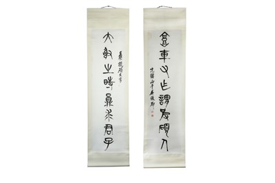 Lot 376 - A PAIR OF HANGING CALLIGRAPHY SCROLLS BY WU CHANG SHUO (1844-1927).