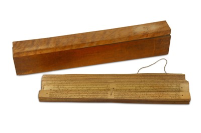 Lot 124 - A PALM-LEAF MANUSCRIPT IN ITS WOODEN CASE...