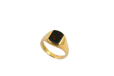 Lot 555 - A bloodstone signet ring In an 18ct gold mount,...