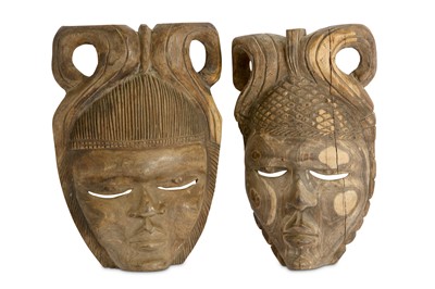 Lot 856 - TWO AFRICAN HARD WOOD MASKS Of pale hard wood,...