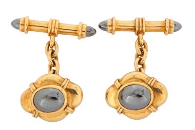 Lot 154 - A pair of gold and hematite cufflinks, by...