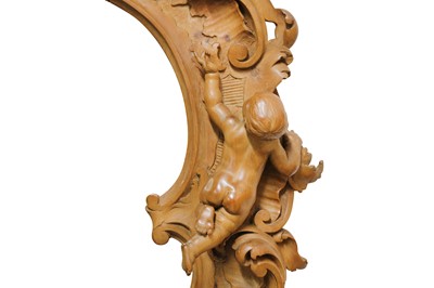 Lot 141 - A LATE 19TH / EARLY 20TH CENTURY CARVED WALNUT...