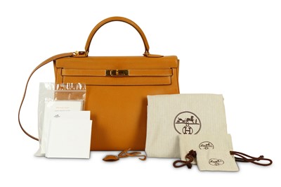 Lot 20 - Hermès Gold Clemence Taurillon Kelly Retourne...
