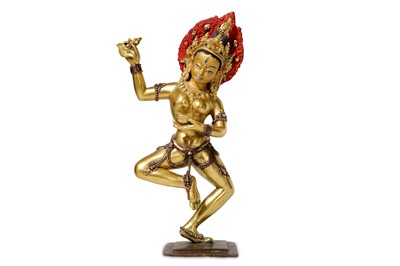 Lot 127 - A Nepalese gilt-bronze figure of Vajrayogini,...